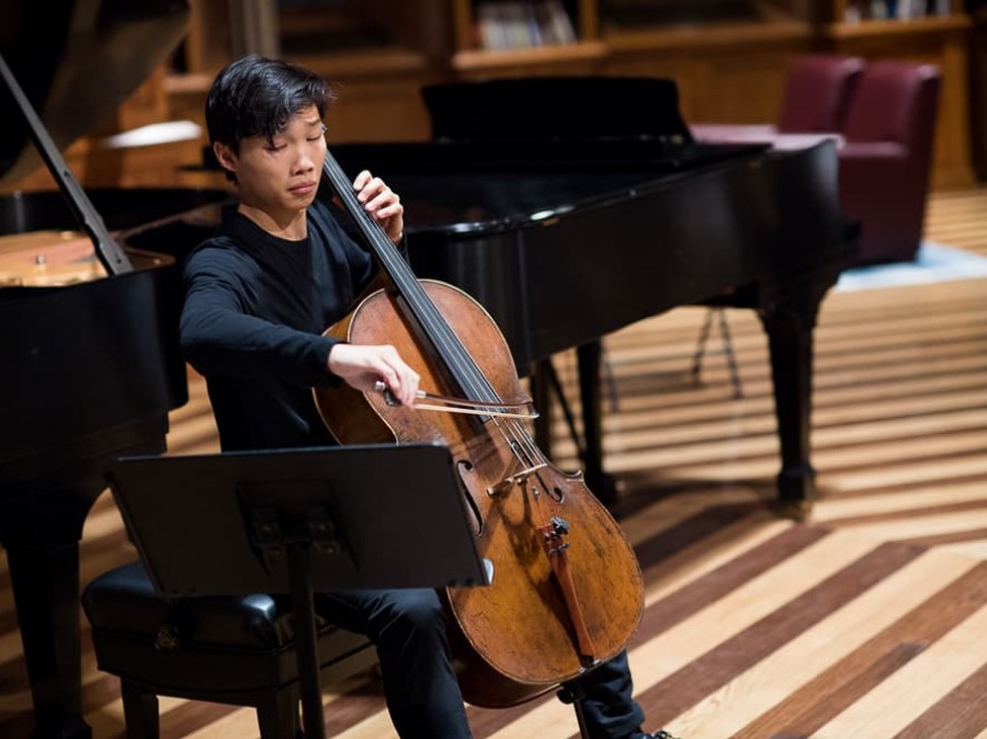 Student performs cello in Chancellor Green