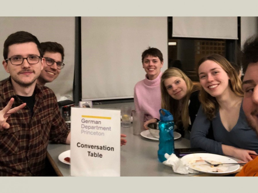 students at german language table conversations