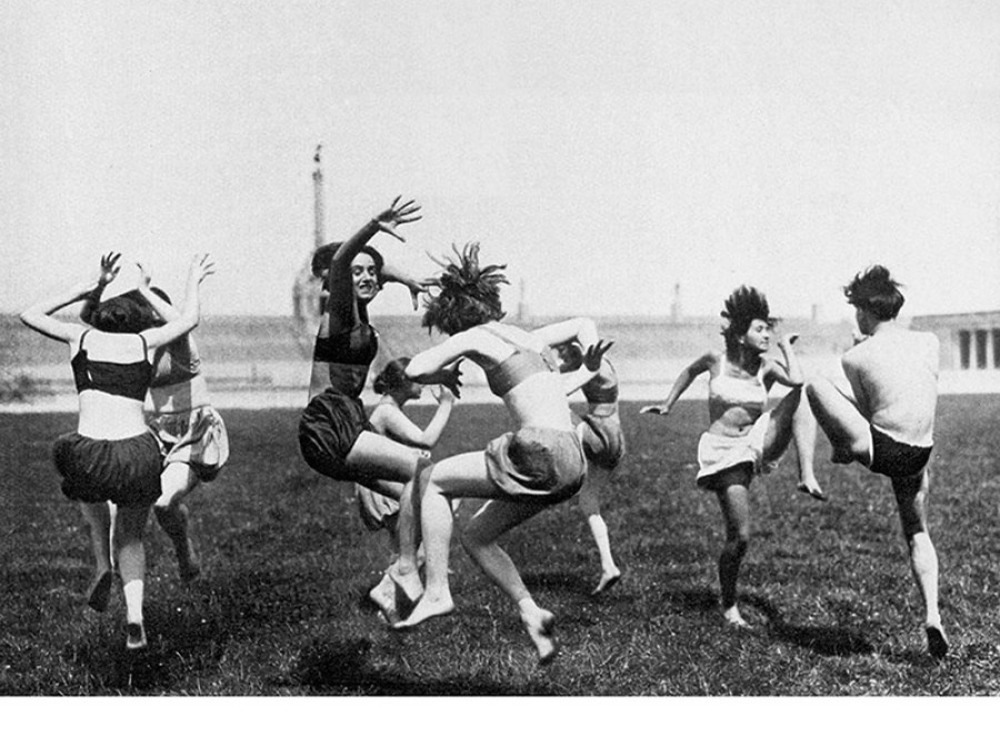 Women in athletic outfits in turn of century caught in dancing, jumping poses