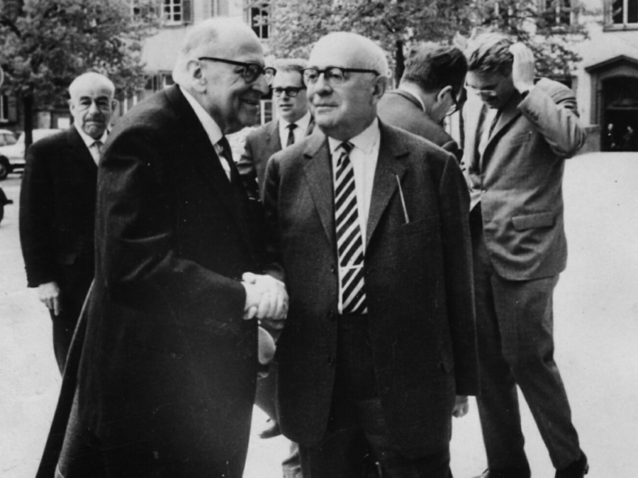 Two men outside having discussion
