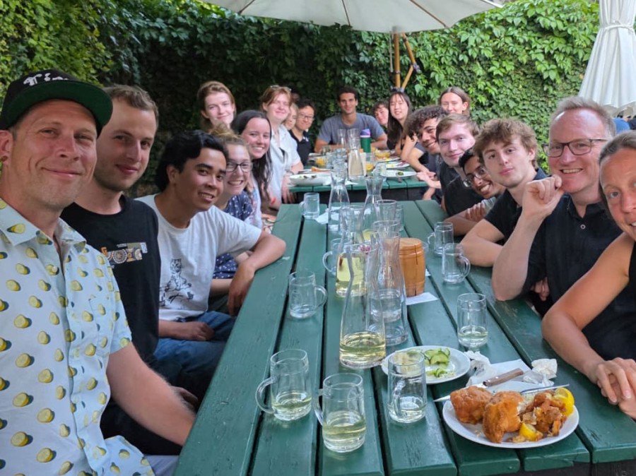 Group outdoors having dinner