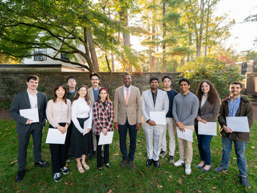 Group photo of graduate students outside