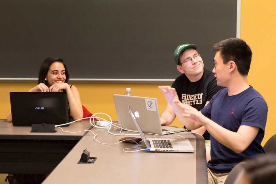 Students at desks in discussion