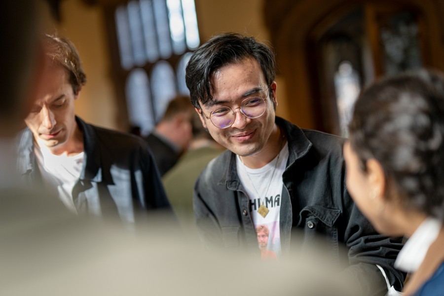 Graduate student Xiaoyao Guo and others at a department event