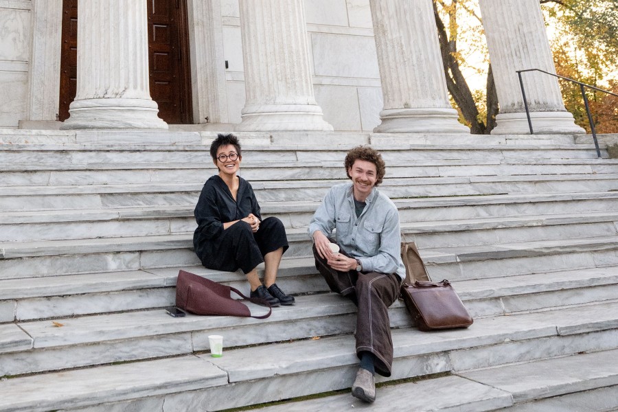 Alina and Alex II sitting on marble stairs