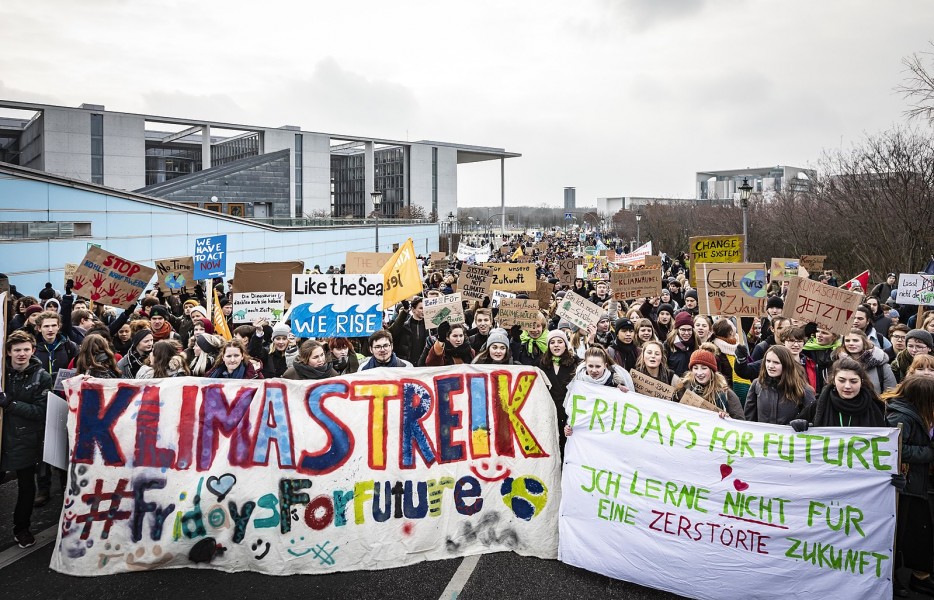 Protestors in Gemany holding banners Fridays for the future
