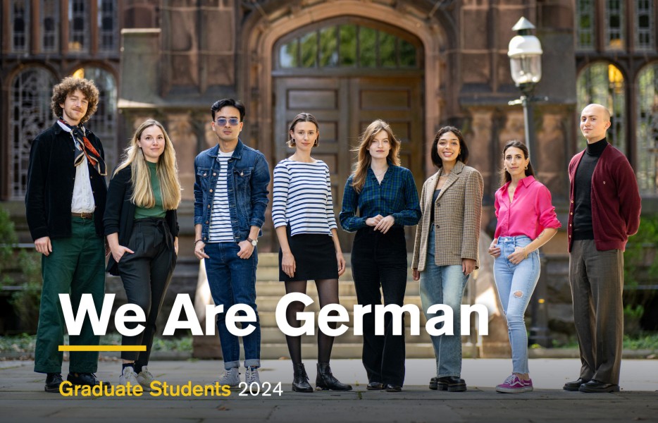 We are German group of graduate students standing side by side in courtyard